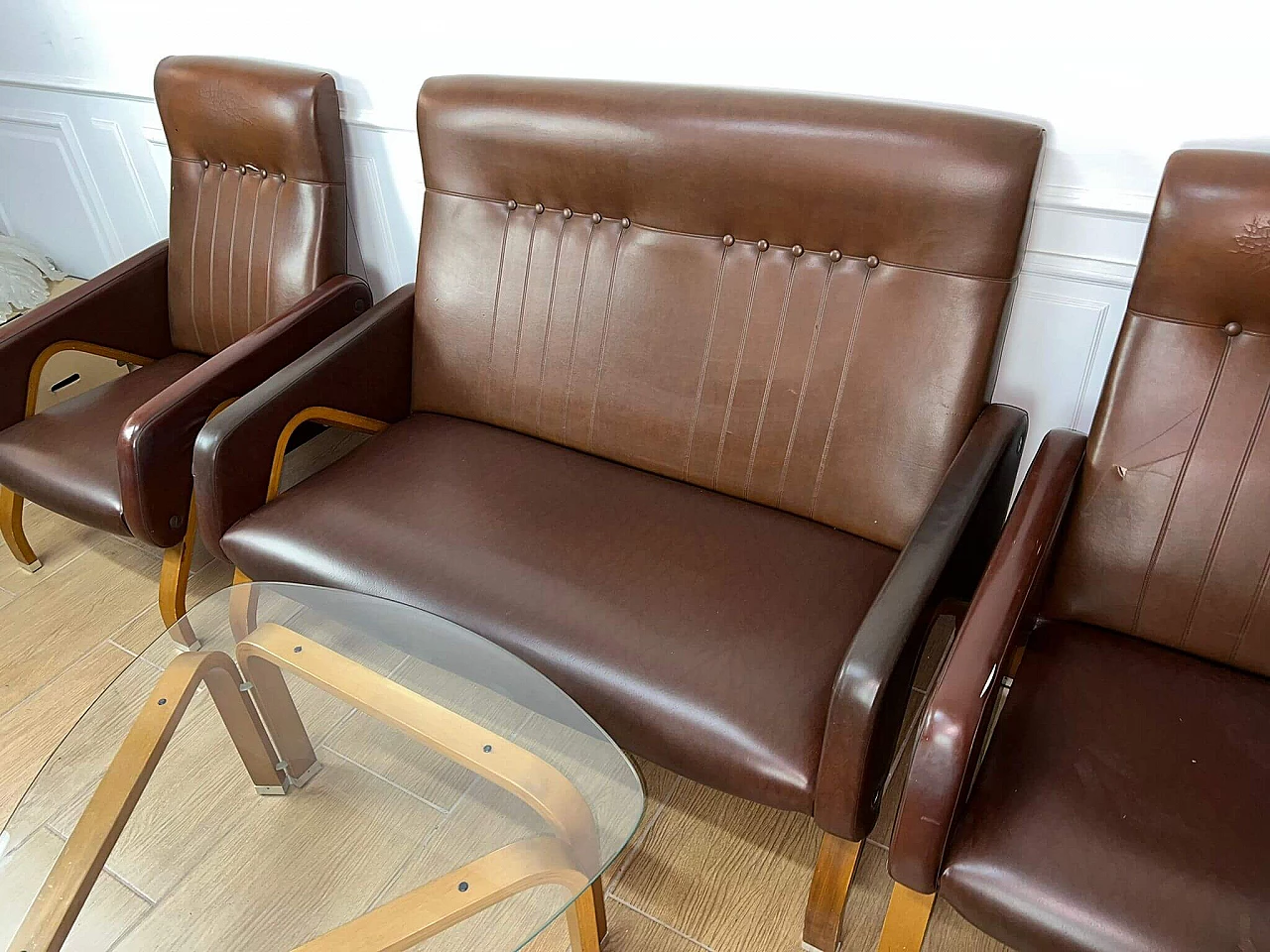 Sofa and pair of armchairs in leather and glass side table, 1960s 2