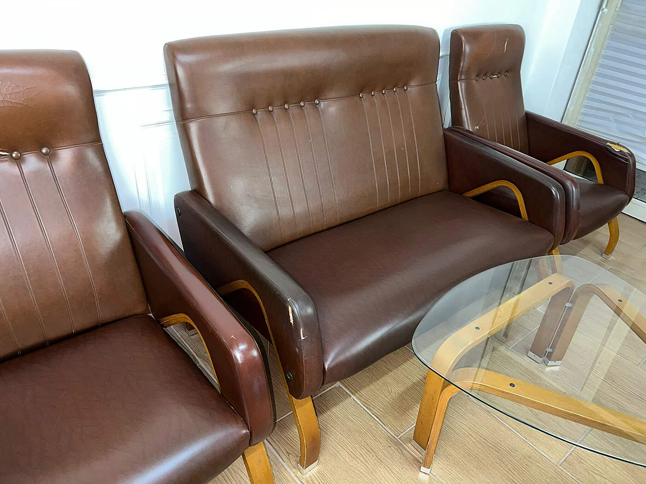 Sofa and pair of armchairs in leather and glass side table, 1960s 14