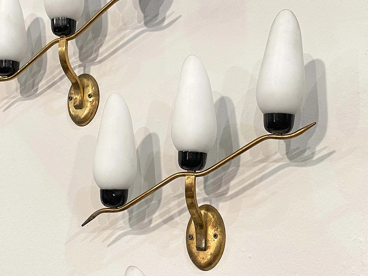 3 Wall lamps in gilded brass and opaline glass, 1960s 5