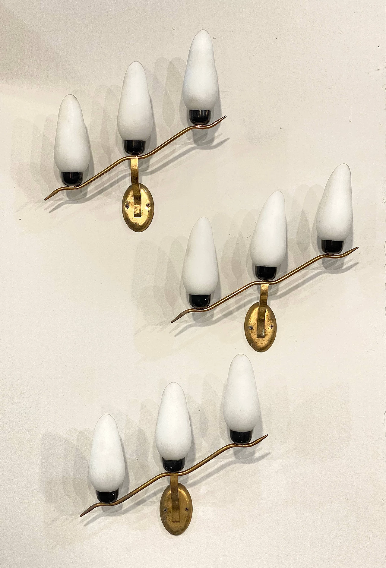 3 Wall lamps in gilded brass and opaline glass, 1960s 9