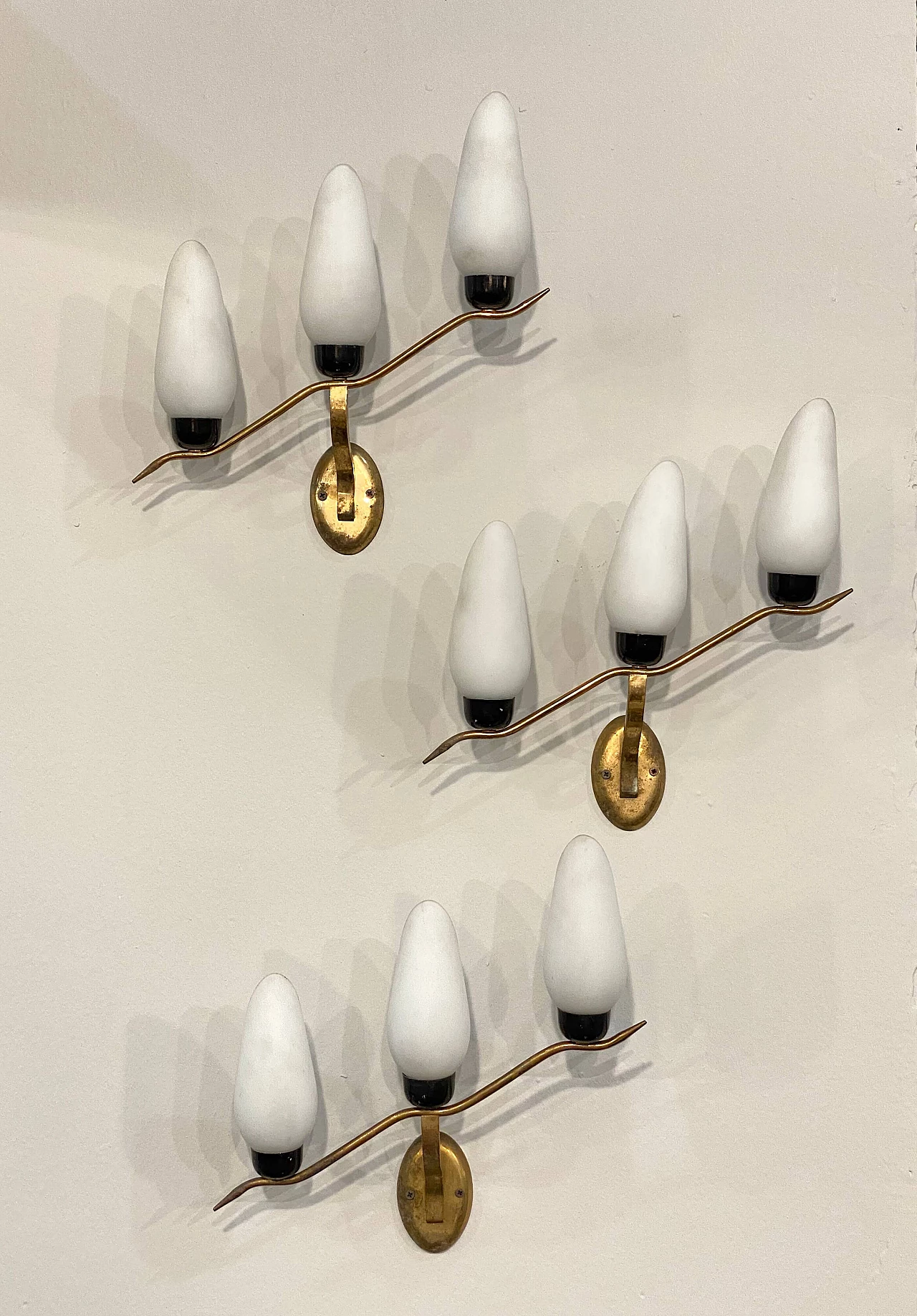 3 Wall lamps in gilded brass and opaline glass, 1960s 10