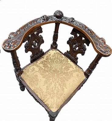 Renaissance style corner chair with carvings, 19th century