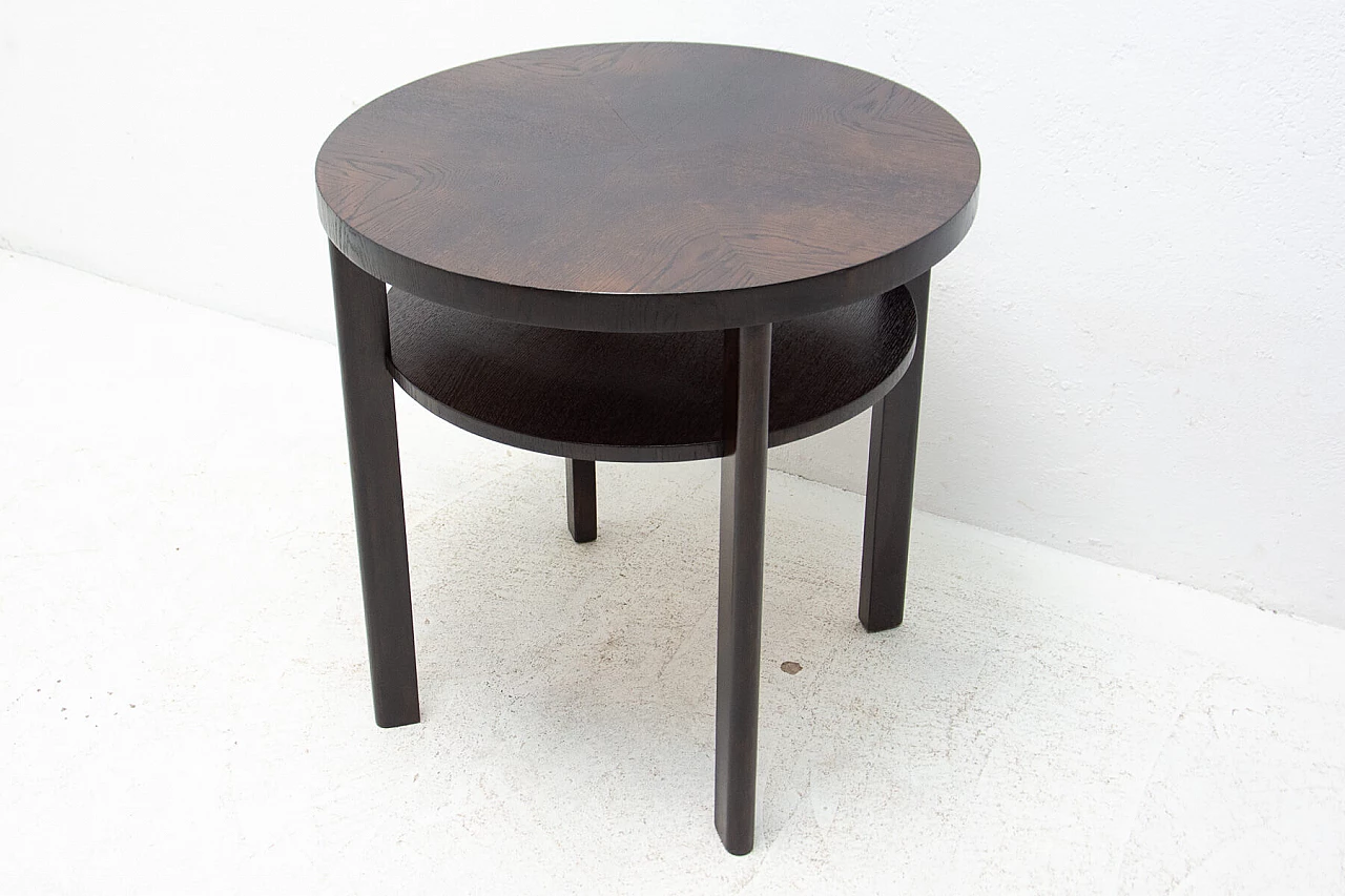 Art Deco round dark oak side table with double shelf, 1950s 2
