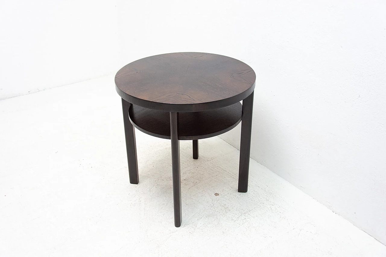 Art Deco round dark oak side table with double shelf, 1950s 4