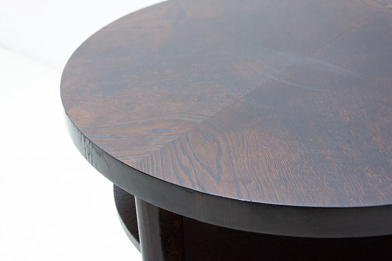 Art Deco round dark oak side table with double shelf, 1950s 9