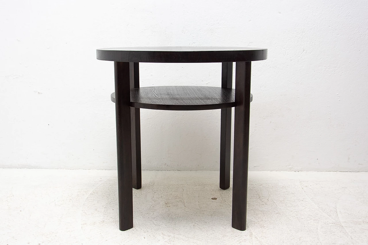 Art Deco round dark oak side table with double shelf, 1950s 13