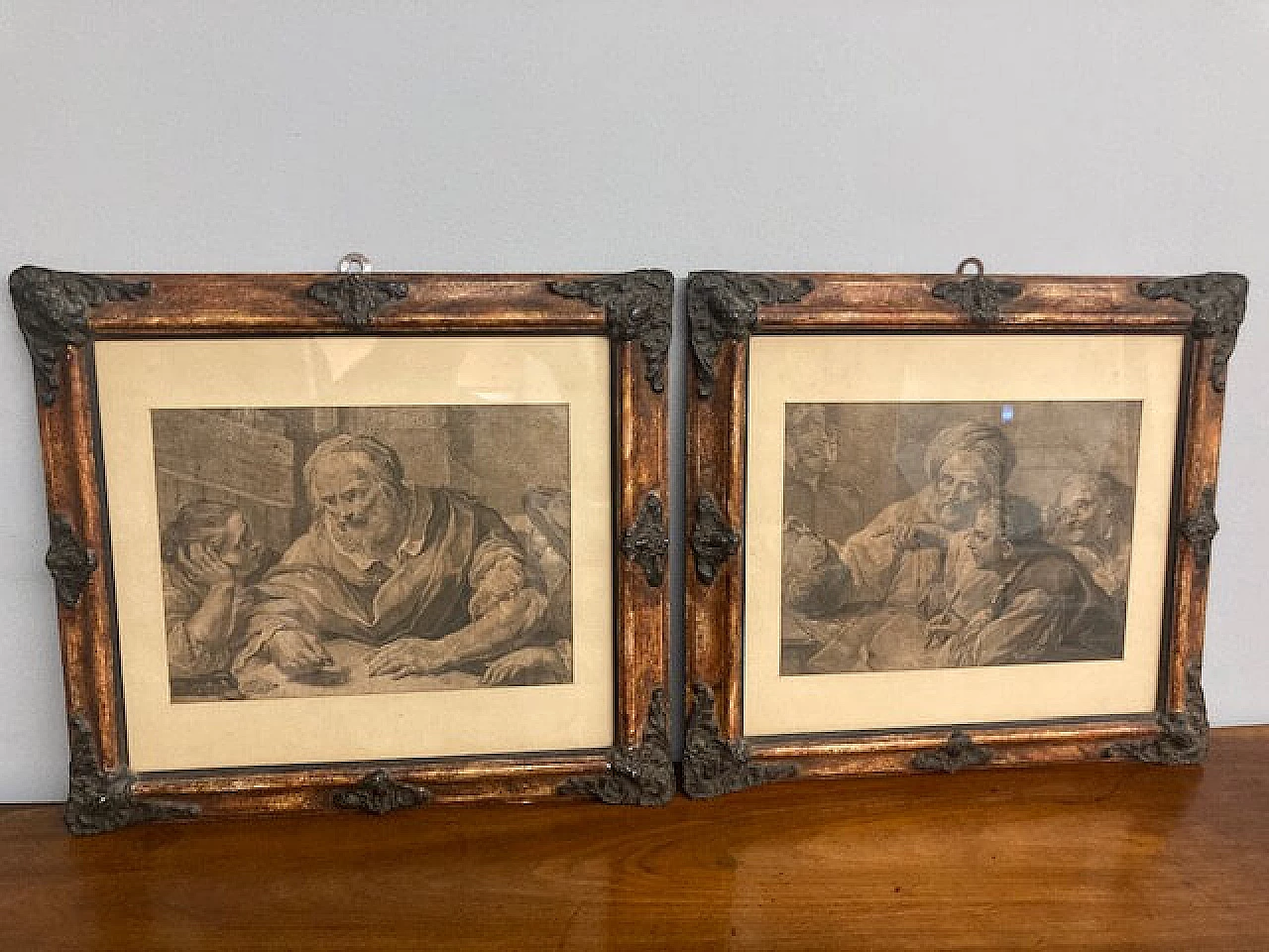 Pair of prints with carved and lacquered faux wood frames, mid-19th century 1
