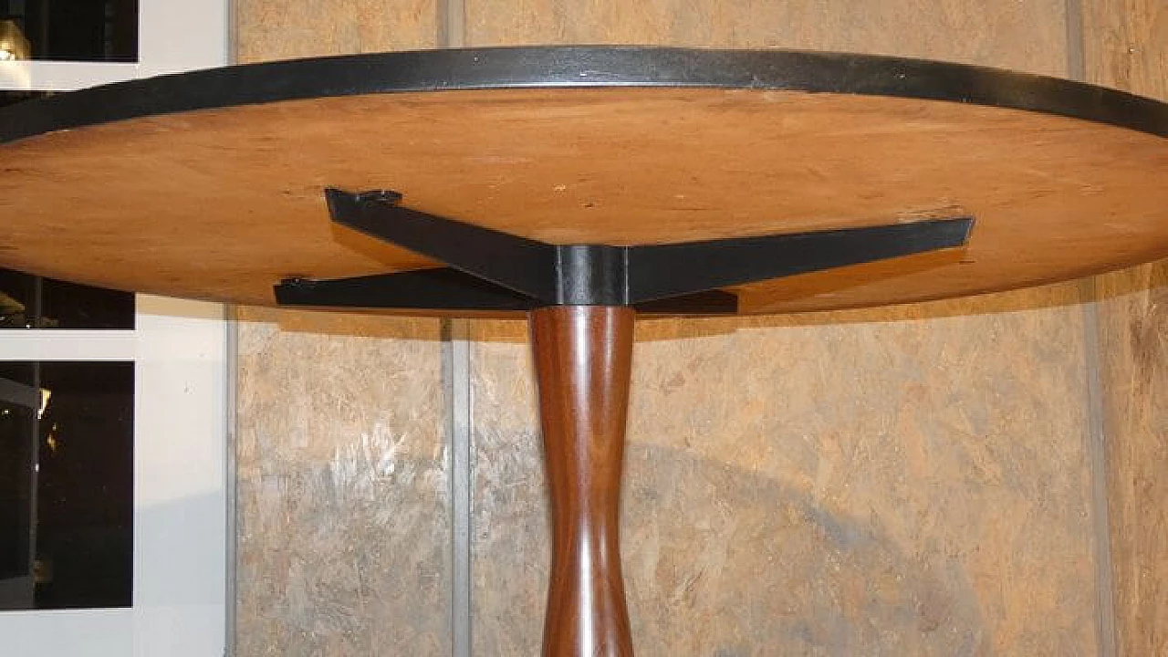 Rosewood round table with metal base, 1950s 8