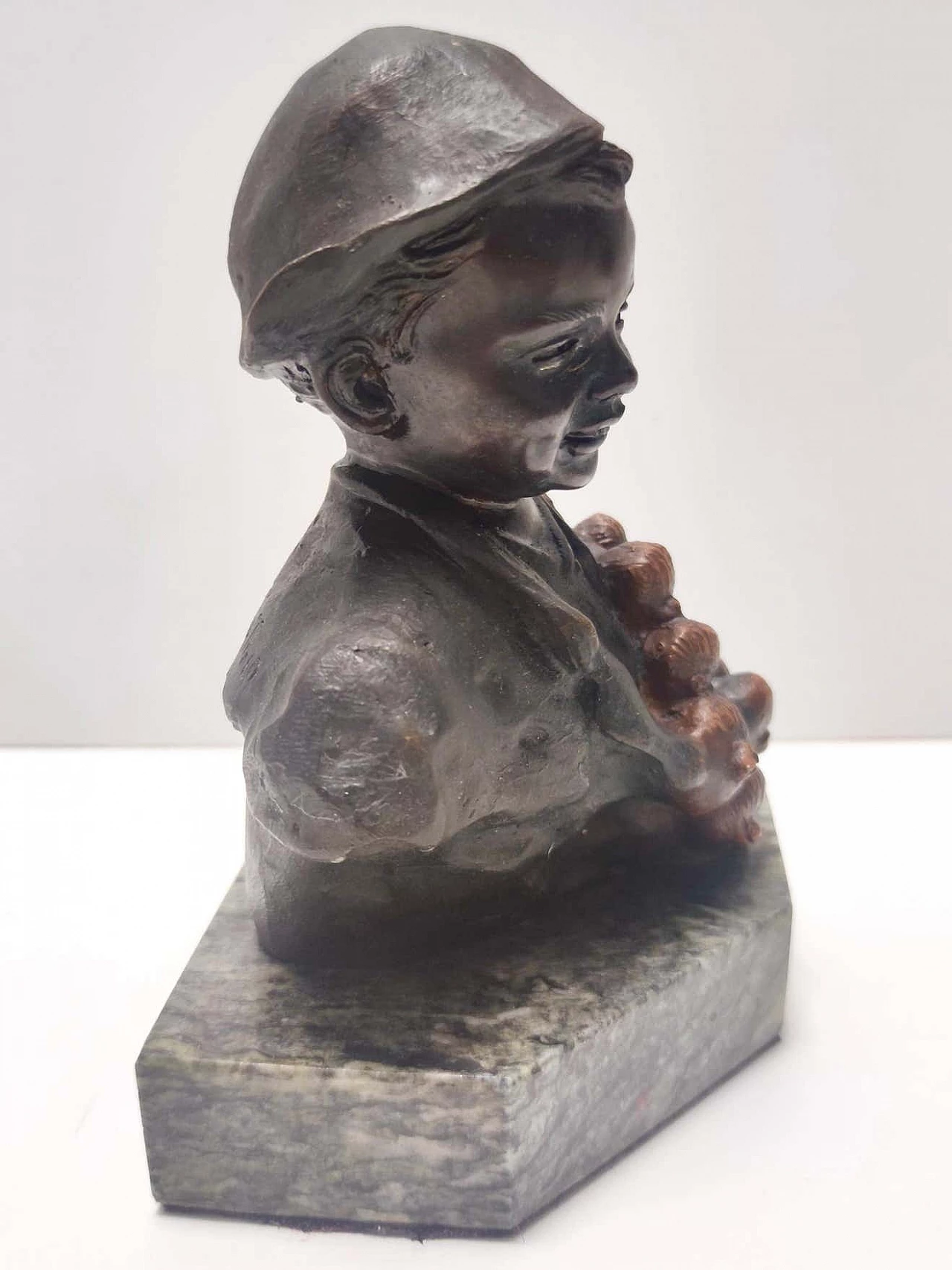 Bronze sculpture of a child selling onions by De Martino, 1920s 7