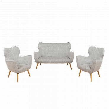 Upholstered sofa and a pair of matching armchairs in the style of Gio Ponti, 1950s