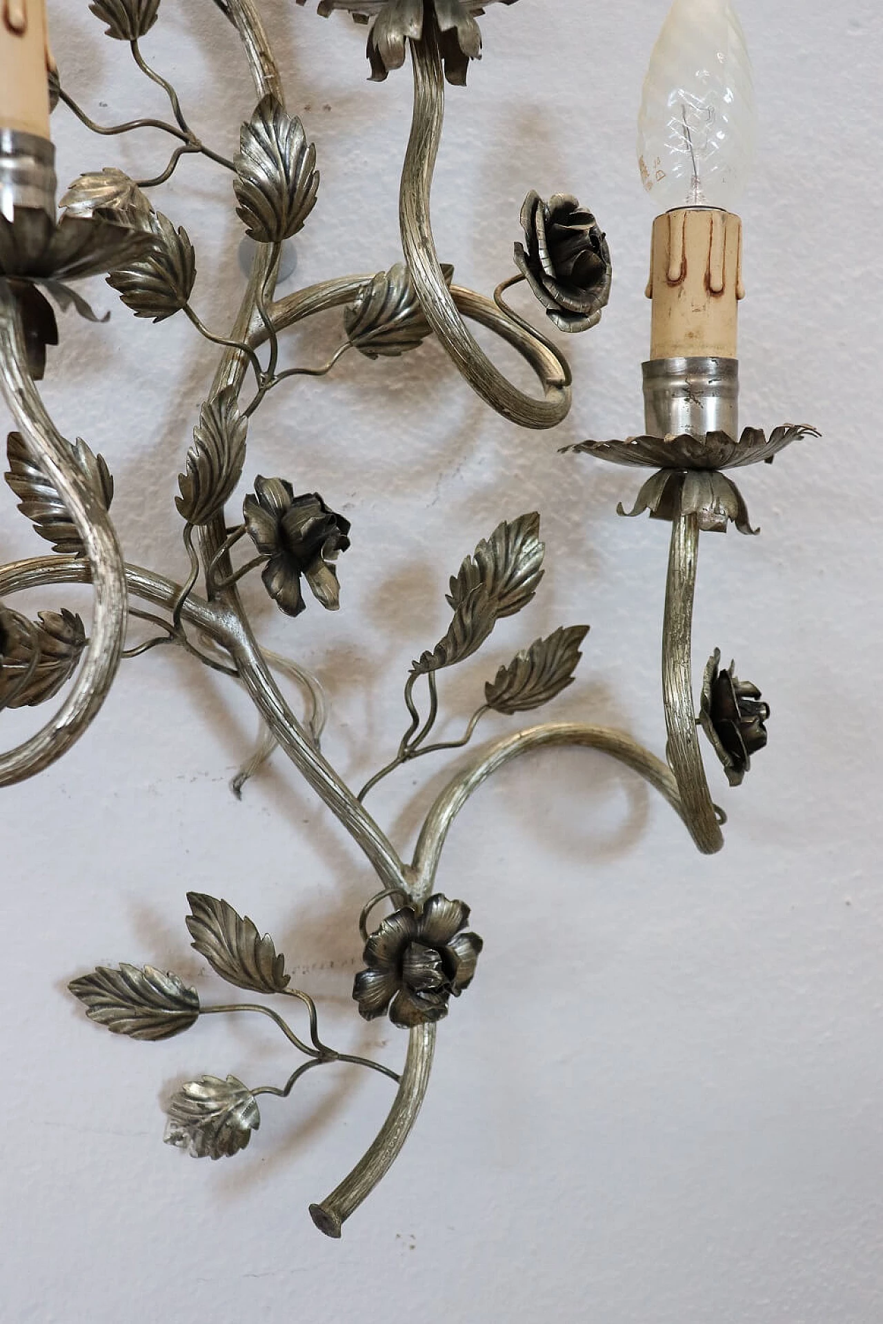 Pair of silver metal sconces with floral motif 10
