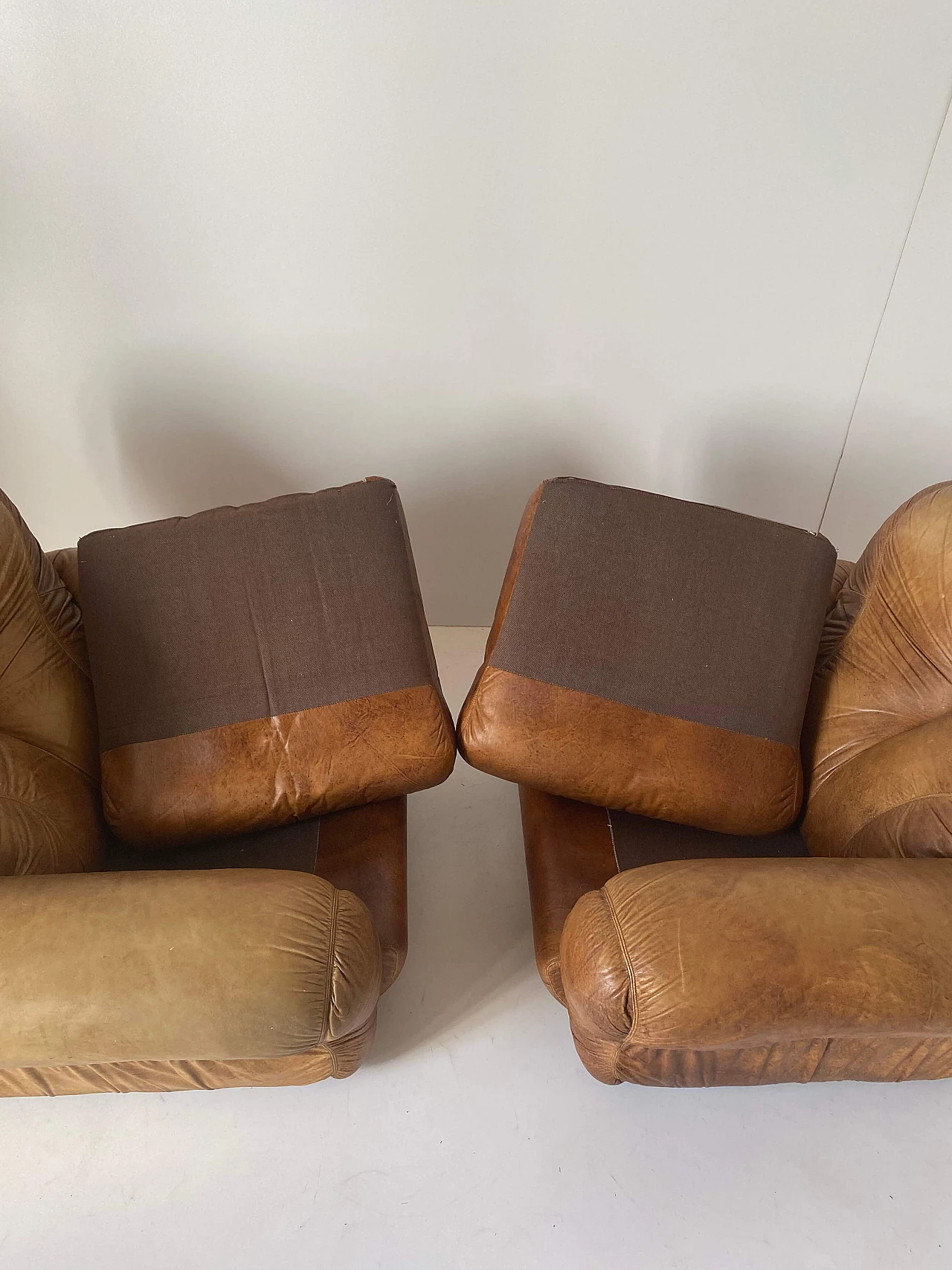 Pair of leather armchairs, 1970s 10