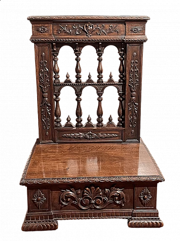 Walnut kneeling-stool with carvings, early 20th century