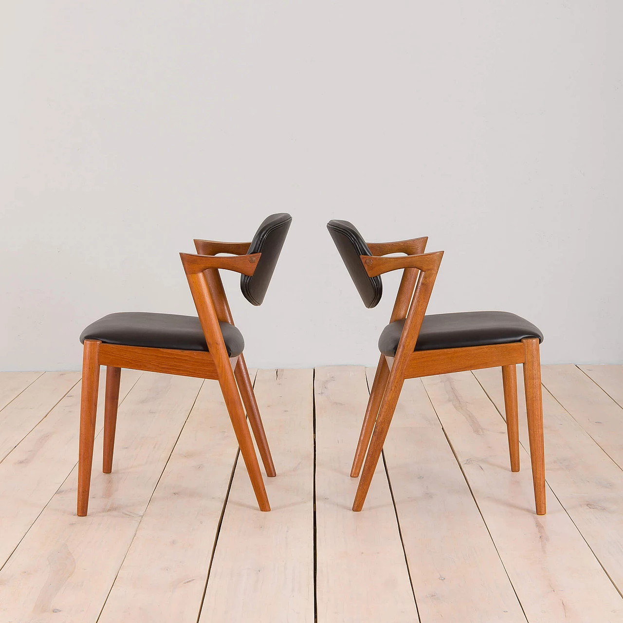 Pair of 42 teak and black leather chairs by Kai Kristiansen for Schou Andersen, 1960s 4
