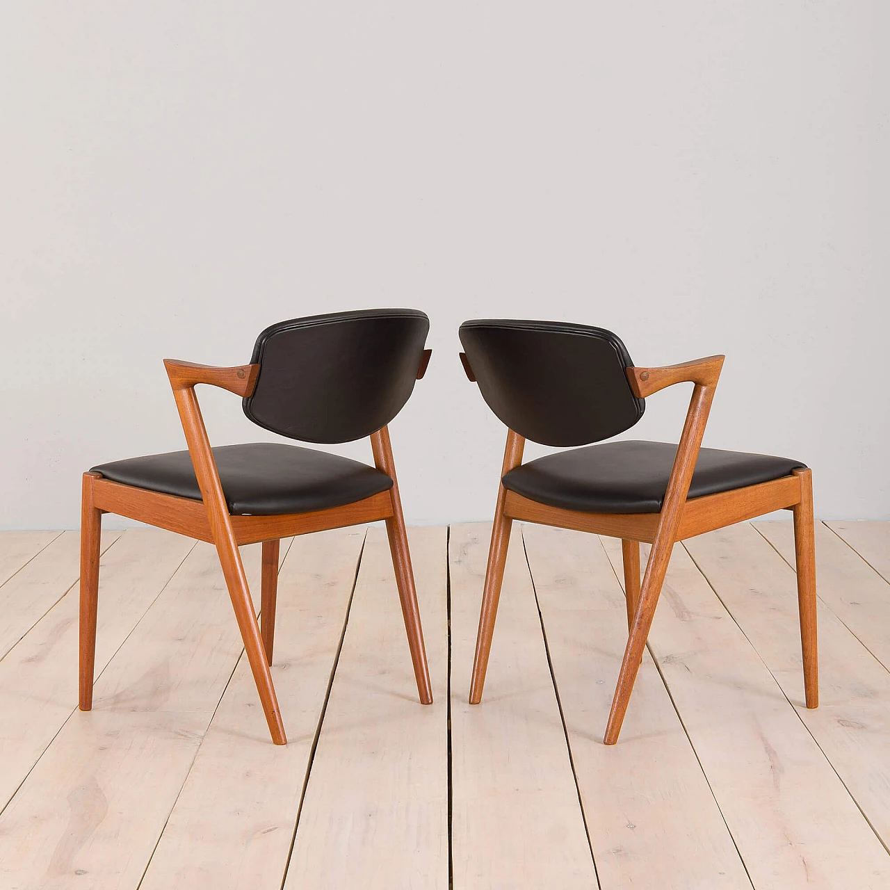 Pair of 42 teak and black leather chairs by Kai Kristiansen for Schou Andersen, 1960s 5