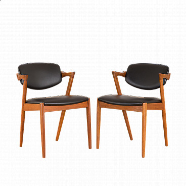 Pair of 42 teak and black leather chairs by Kai Kristiansen for Schou Andersen, 1960s