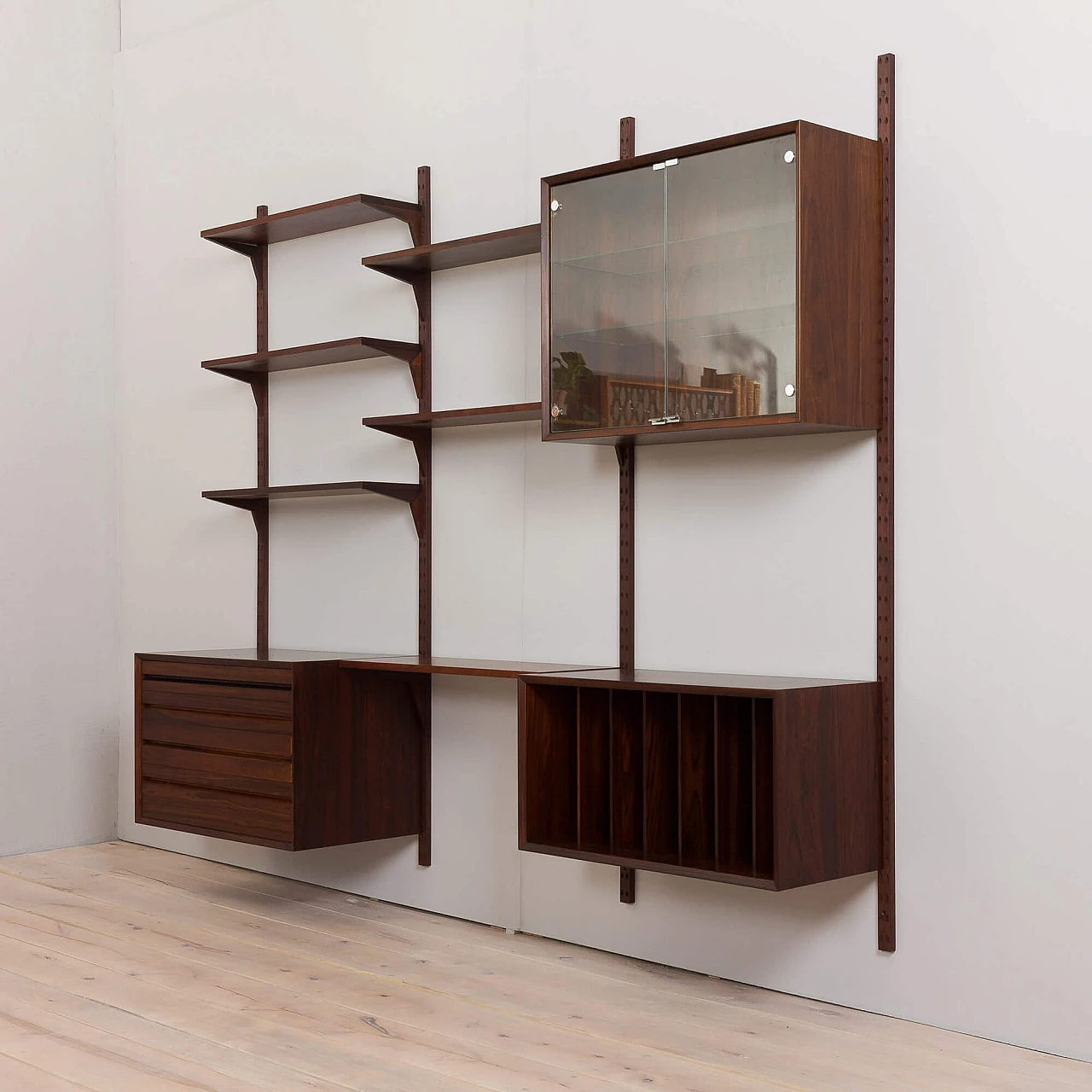 Three-bay wall-mounted rosewood bookcase by Poul Cadovius for Cado, 1960s 4