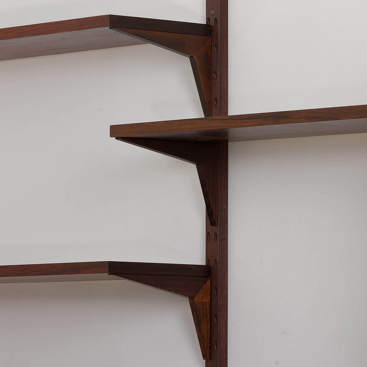 Three-bay wall-mounted rosewood bookcase by Poul Cadovius for Cado, 1960s 9