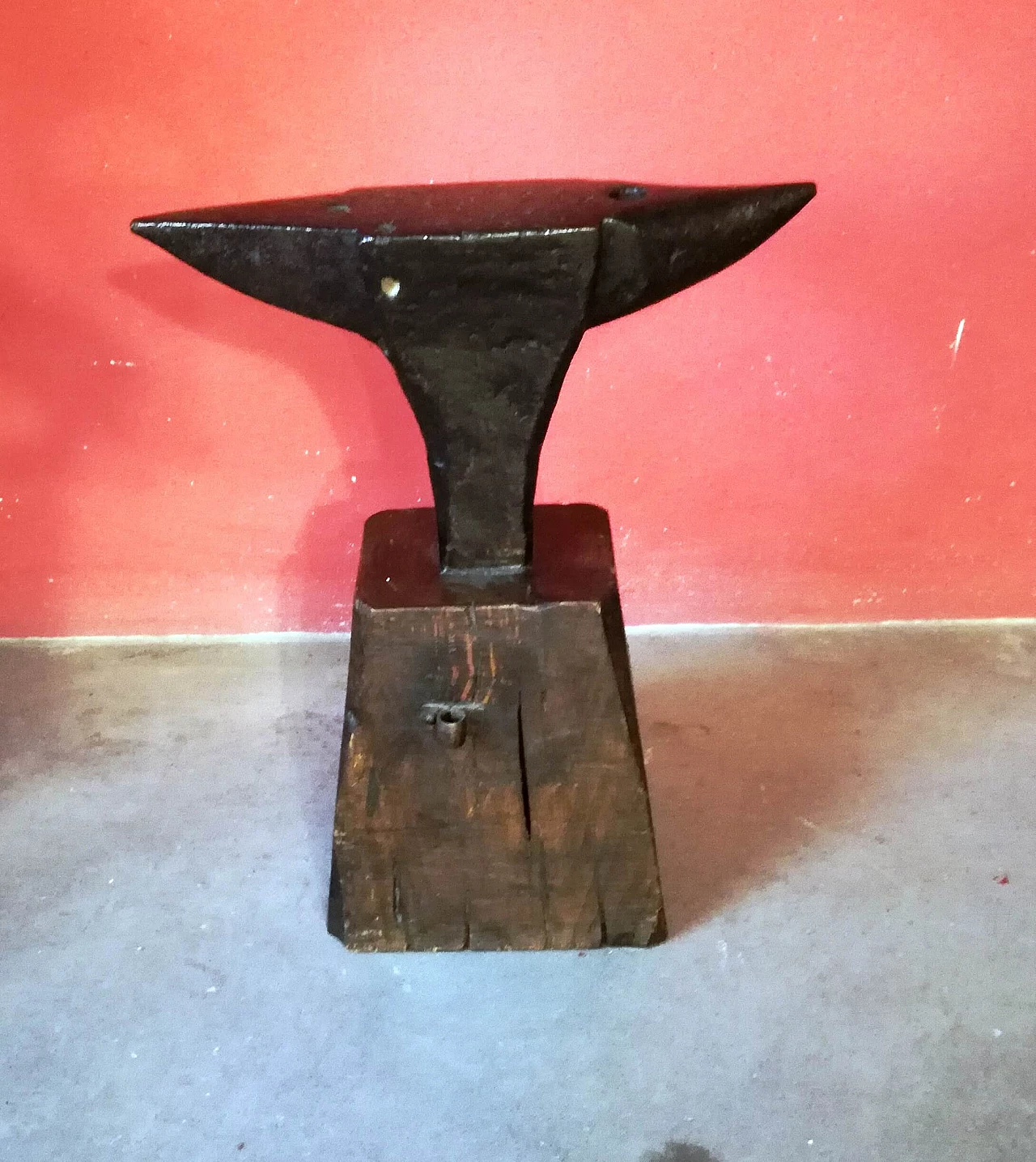 Tempered steel anvil with wood stand, 19th century 1
