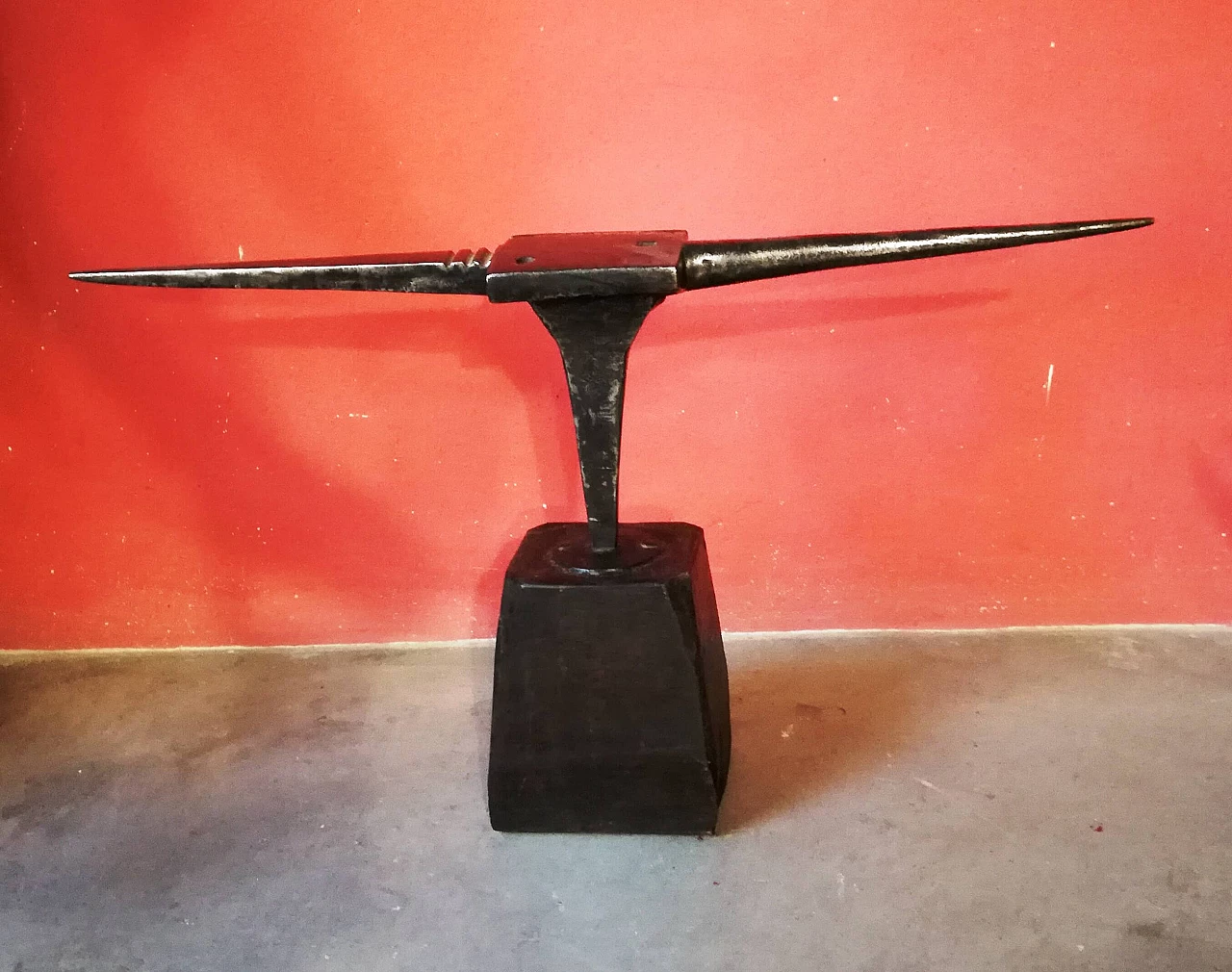 Steel anvil with wood stand, 19th century 1