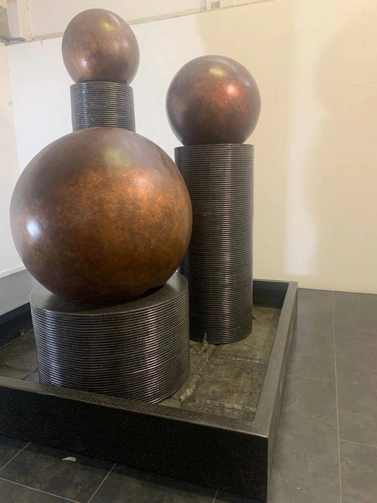 Fibreglass fountain with rotating copper spheres by Ravi Shing, 1990 1