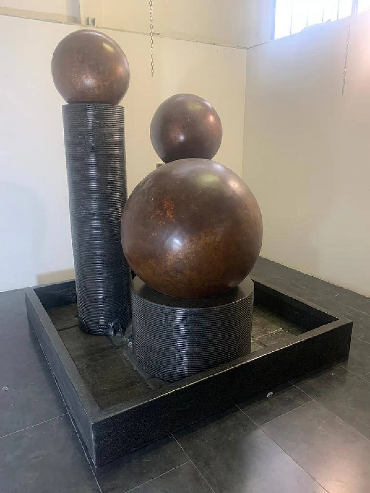 Fibreglass fountain with rotating copper spheres by Ravi Shing, 1990 2