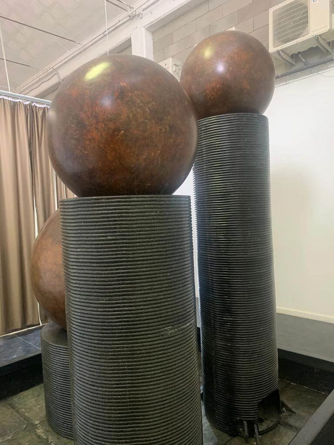 Fibreglass fountain with rotating copper spheres by Ravi Shing, 1990 11