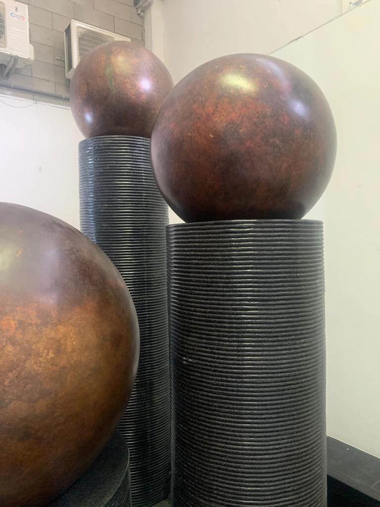 Fibreglass fountain with rotating copper spheres by Ravi Shing, 1990 14
