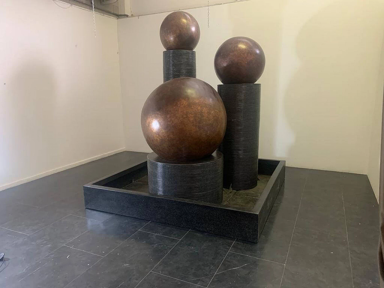 Fibreglass fountain with rotating copper spheres by Ravi Shing, 1990 16