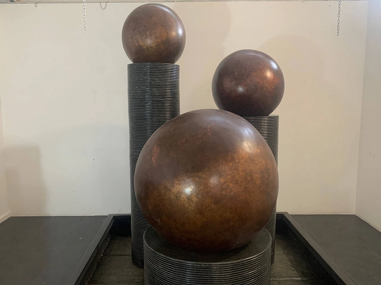 Fibreglass fountain with rotating copper spheres by Ravi Shing, 1990 17