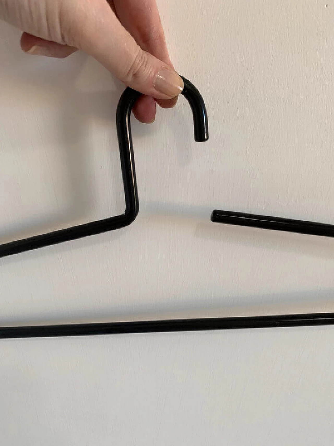 10 Black lacquered metal hangers, 1980s 2