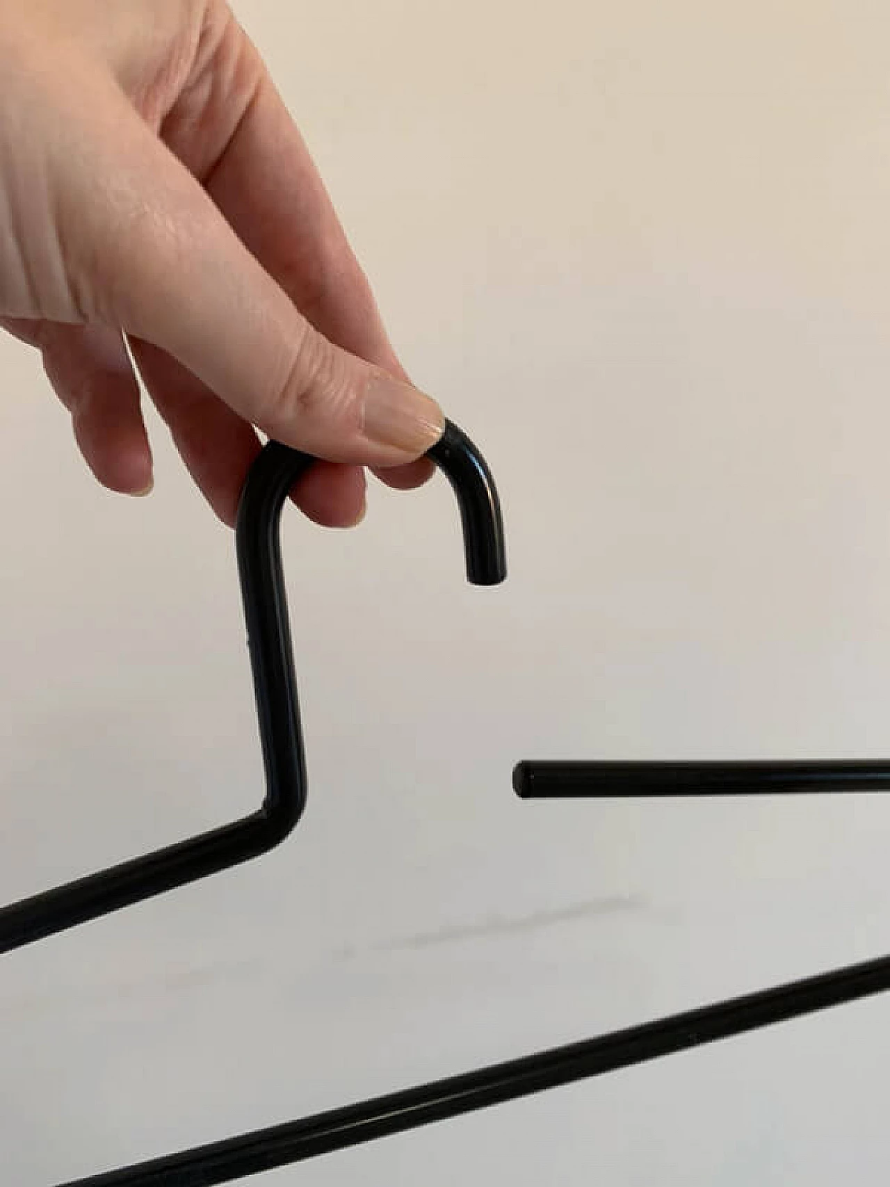 10 Black lacquered metal hangers, 1980s 4