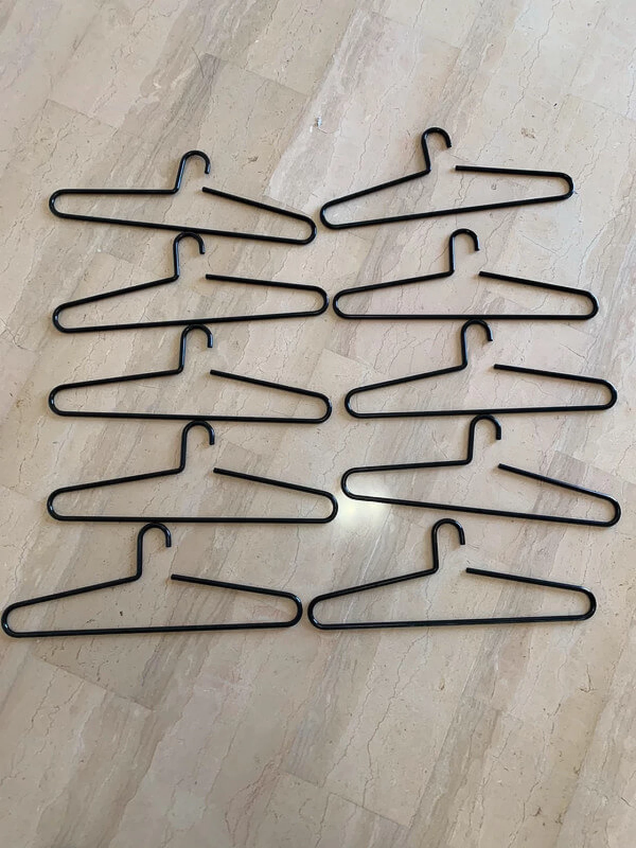 10 Black lacquered metal hangers, 1980s 7