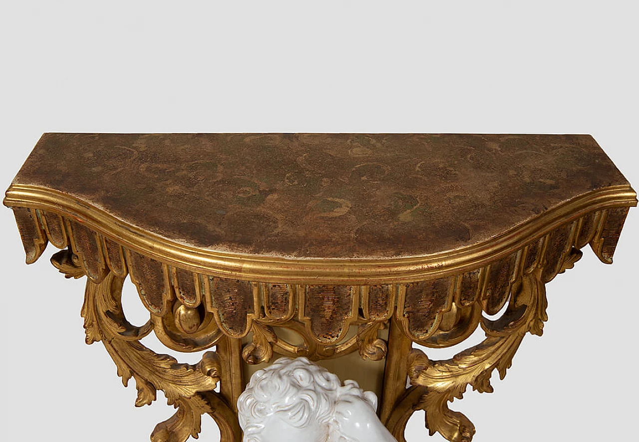 Carved wooden console table with glazed ceramic putto, early 20th century 2