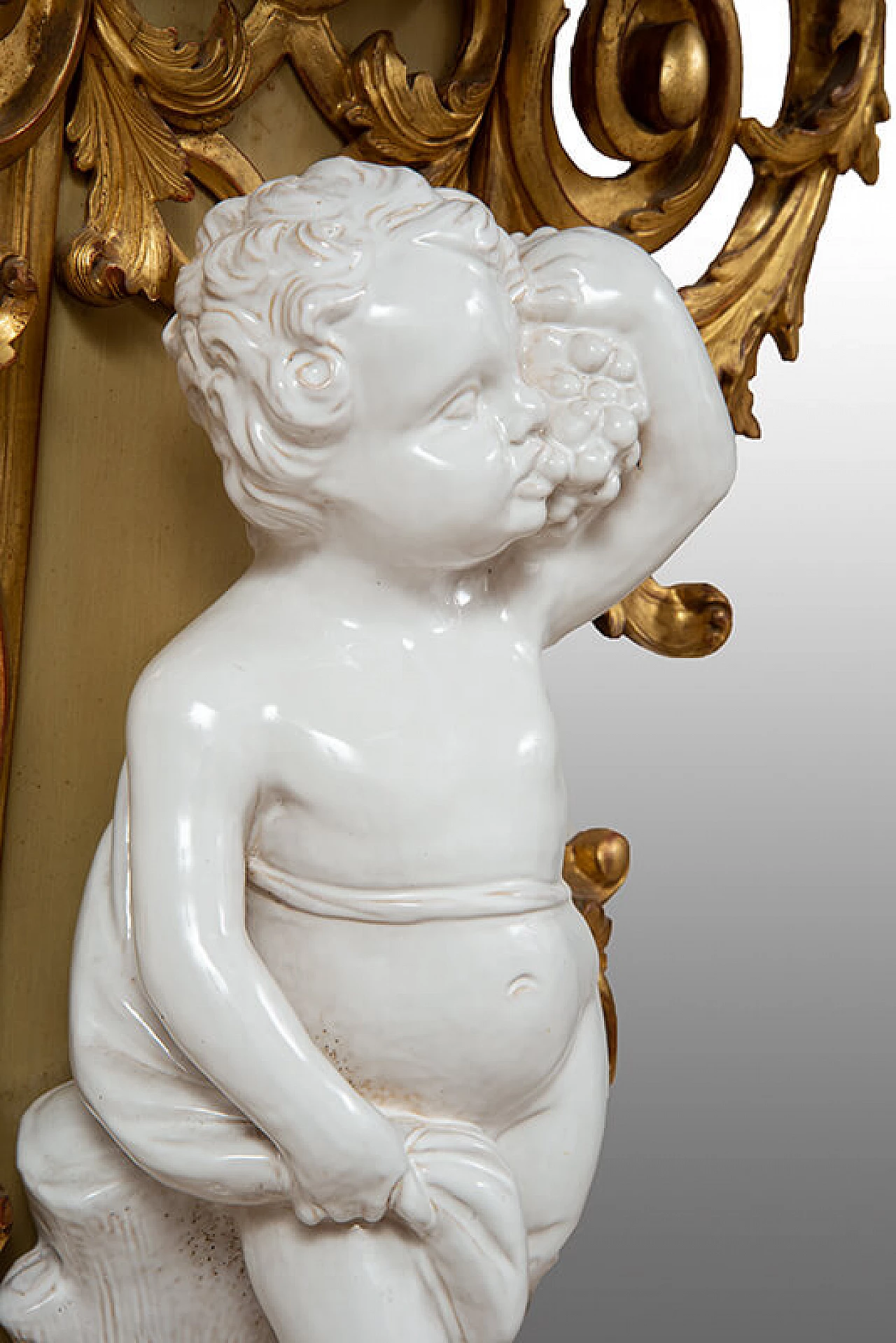 Carved wooden console table with glazed ceramic putto, early 20th century 4