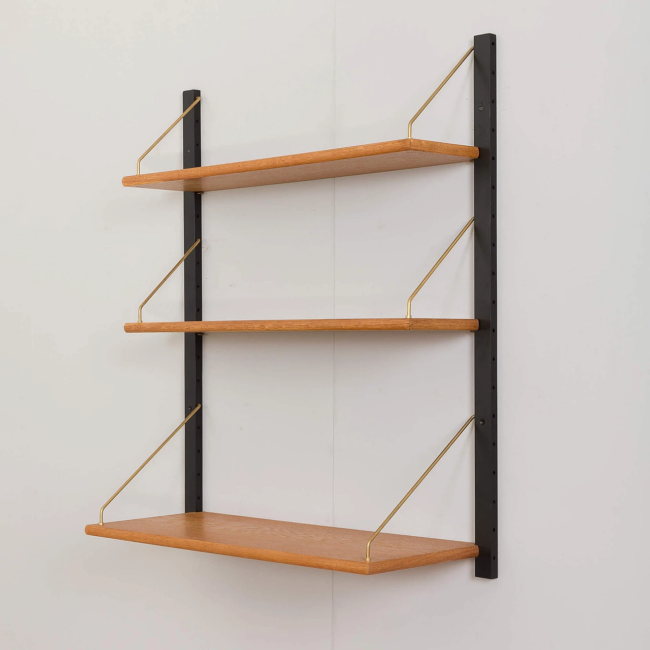 Wall-mounted oak bookcase in the style of Poul Cadovius, 1970s 4