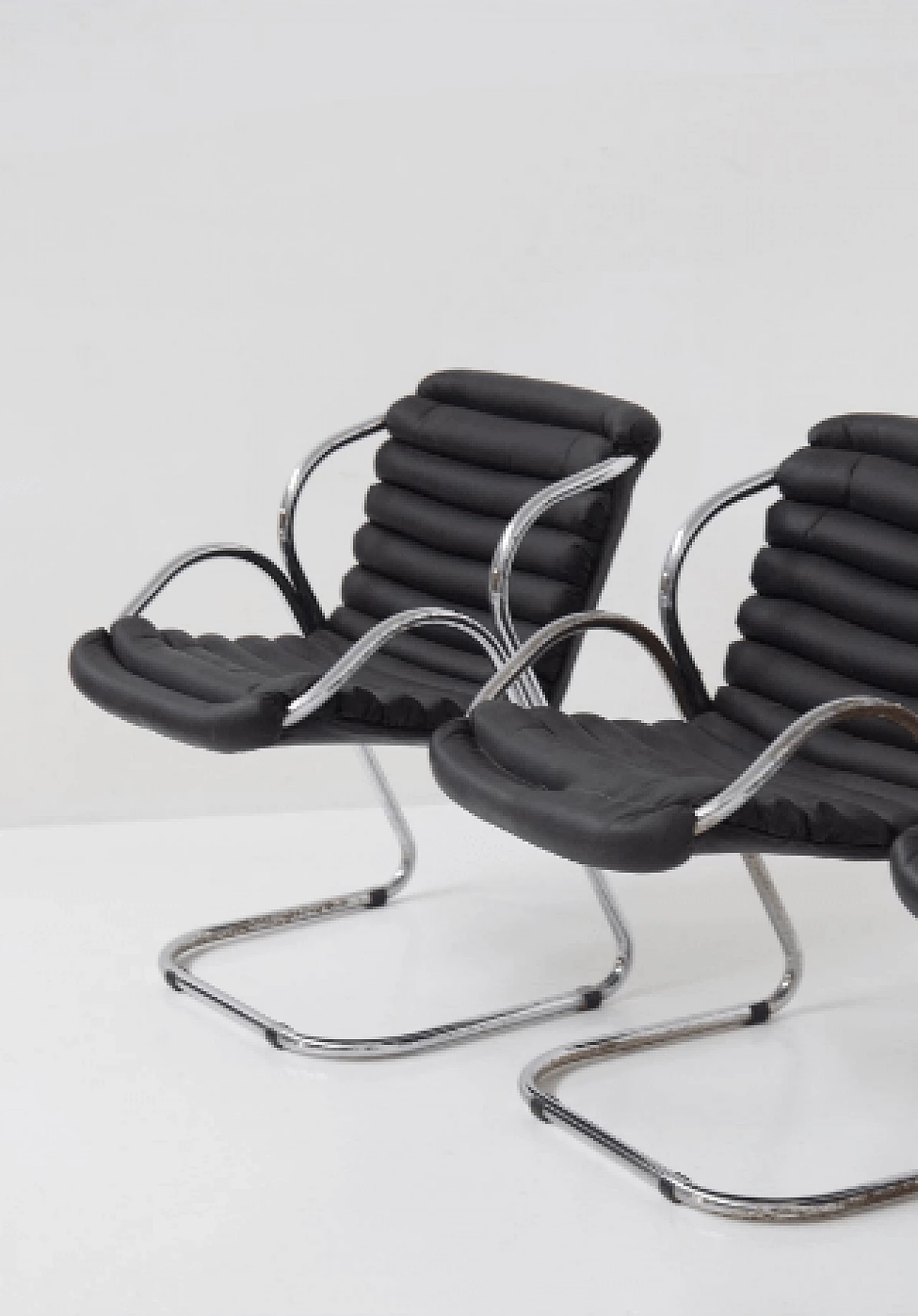 4 Chairs in chromed steel and black leather, 1960s 12