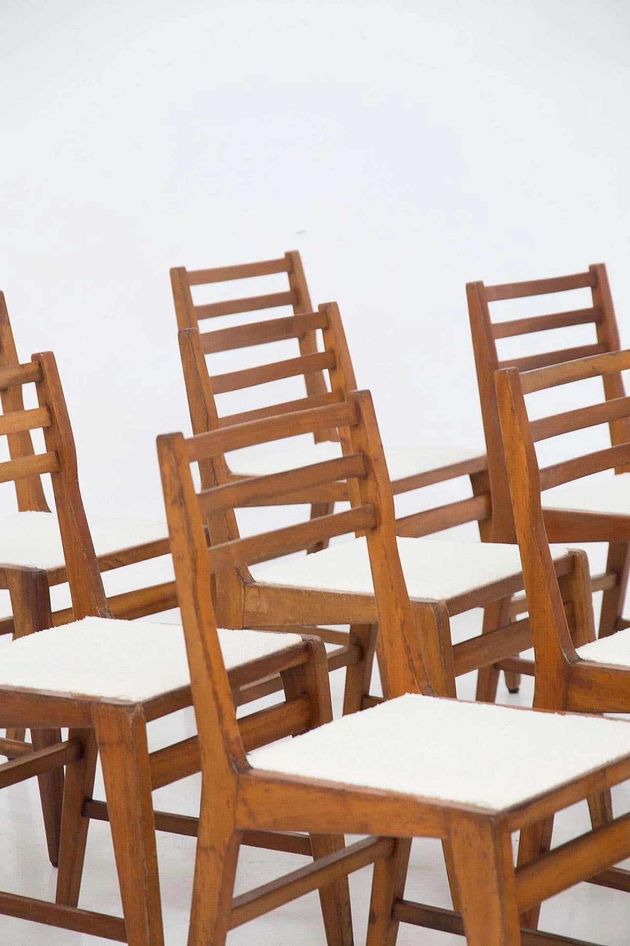 12 Wooden chairs with bouclé seat by Studio B.B.P.R, 1950s 1