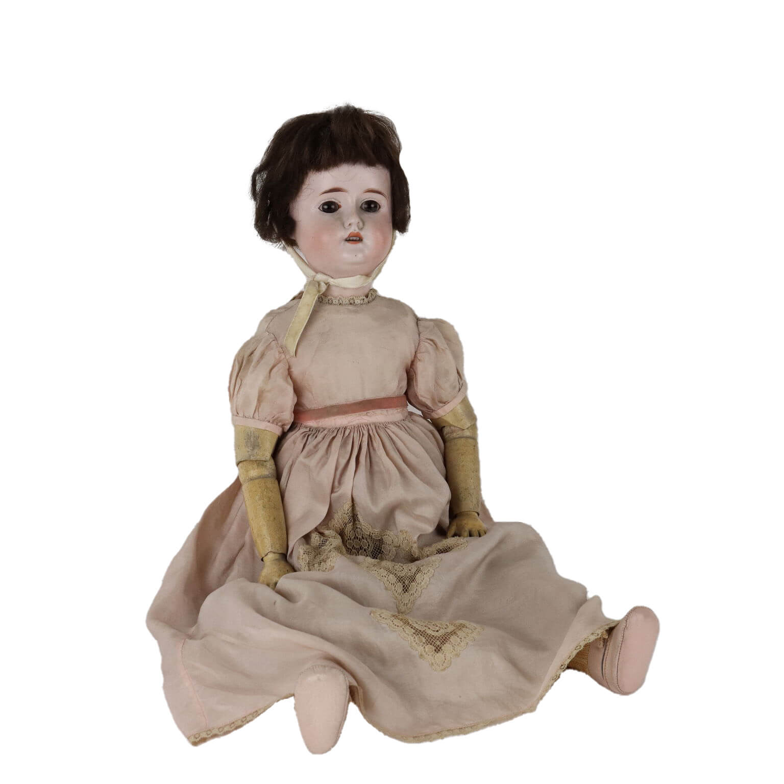 Bambola con testa in porcellana, arti in legno e occhi in vetro