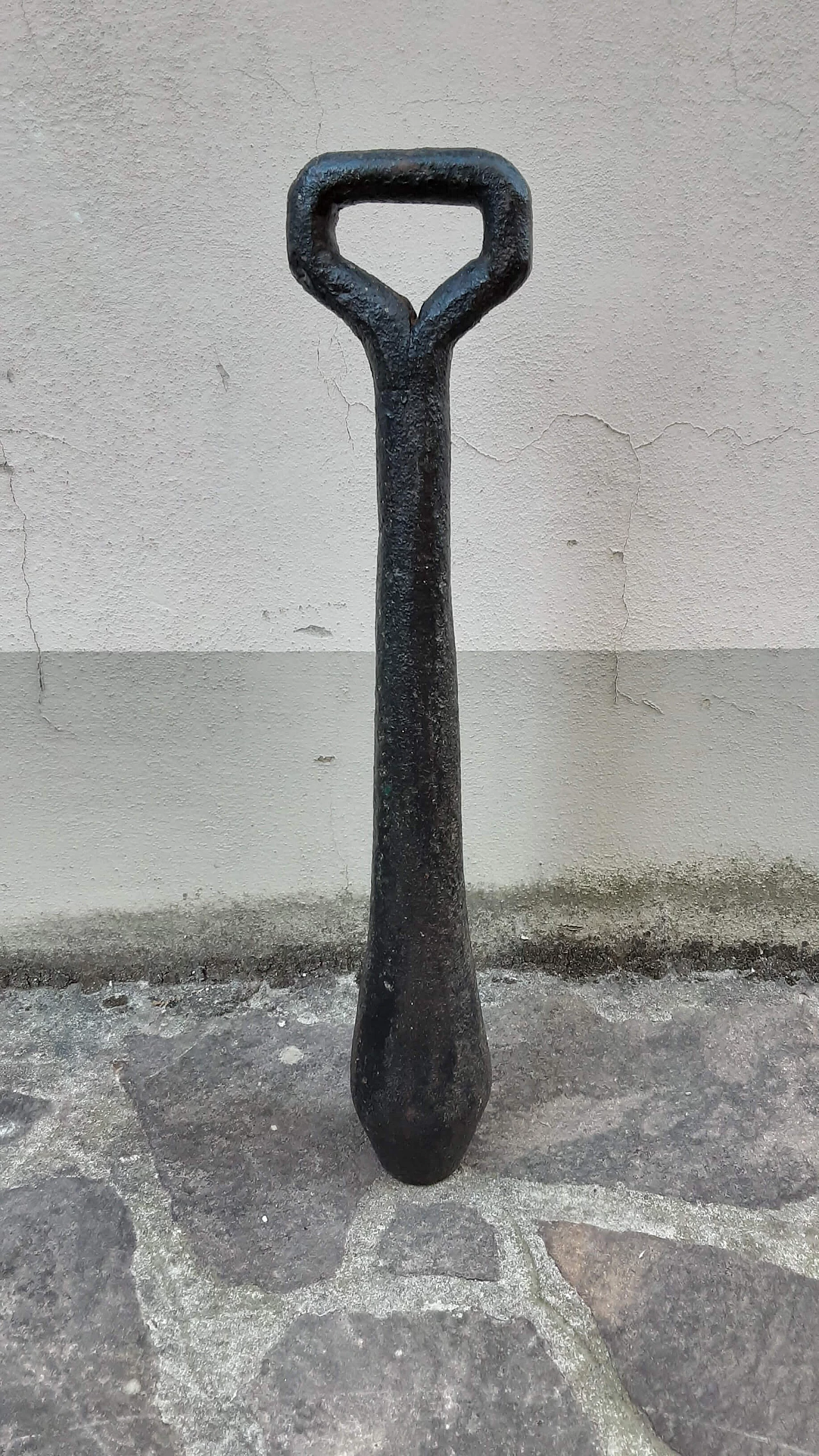 Black painted metal bell clapper, 17th century 1