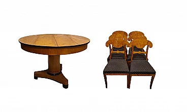 6 Biedermeier chairs and extendable table in blond walnut, 19th century