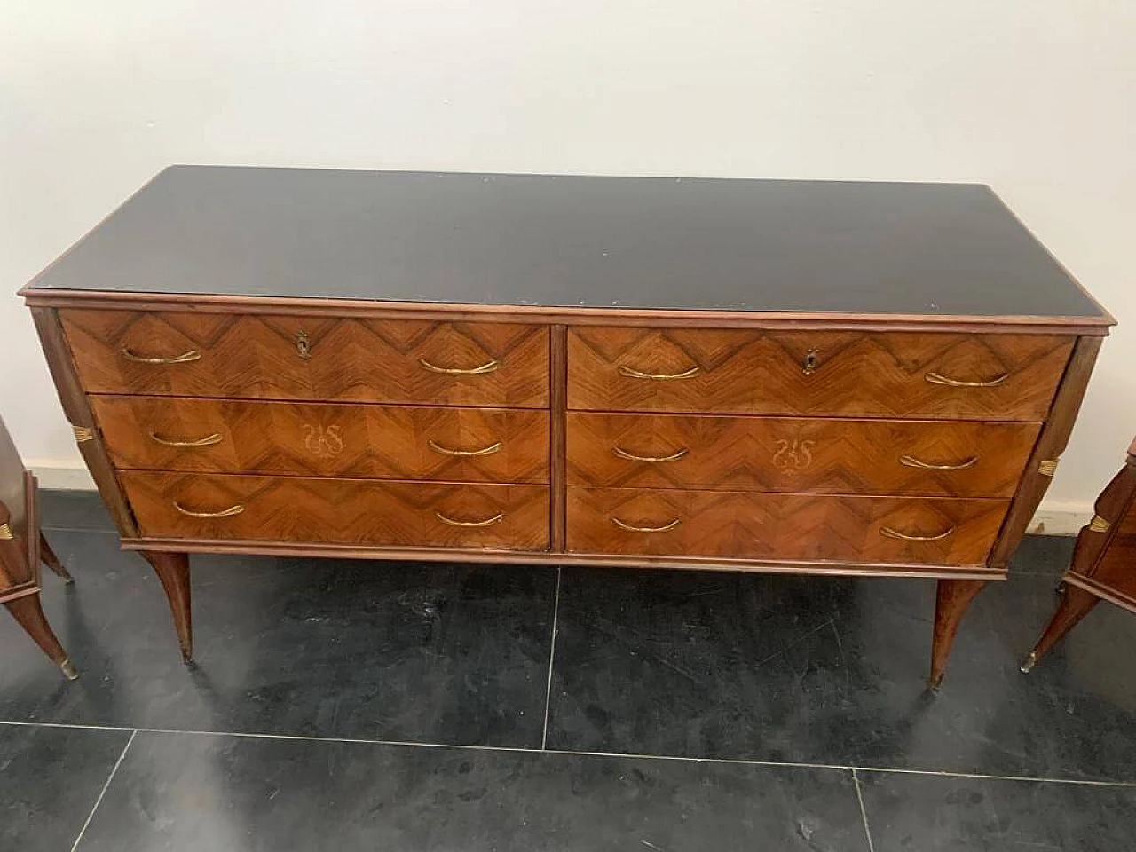 Rosewood chest of drawers with brass details, 1950s 4