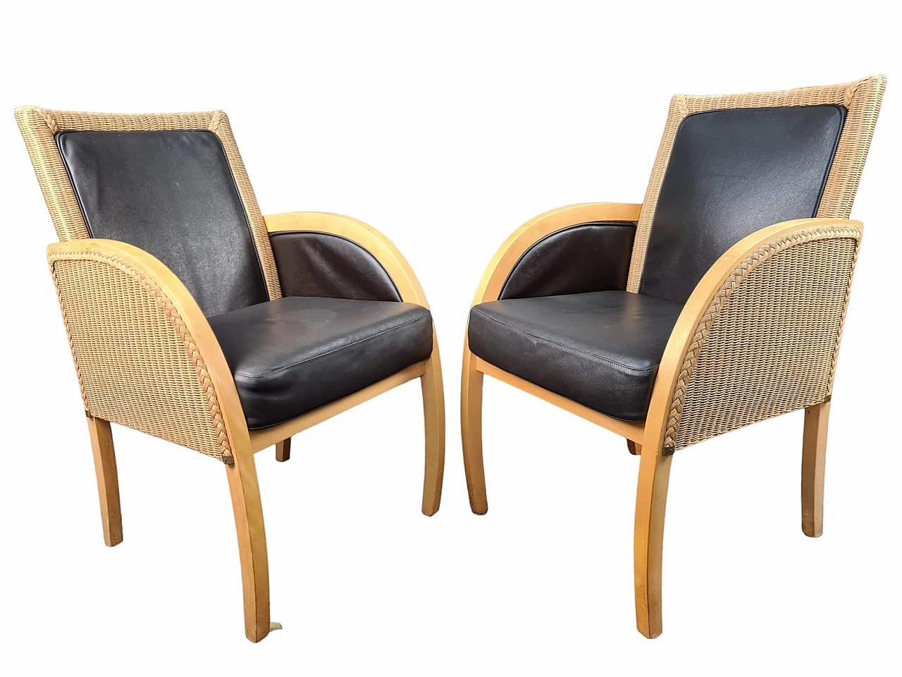 Pair of wood, rattan and leather armchairs by Lloyd Loom 1