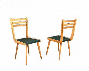 Pair of beech and leatherette chairs by Reguitti, 1950s