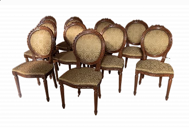 10 Solid walnut chairs in Louis XVI style with turned legs, early 20th century