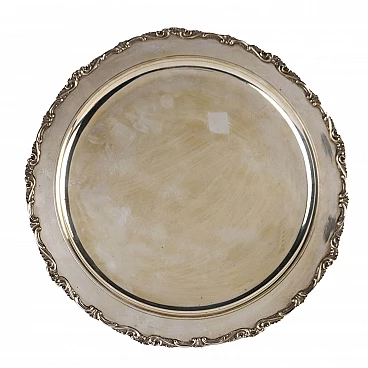 Silver plate with relief volutes on rim