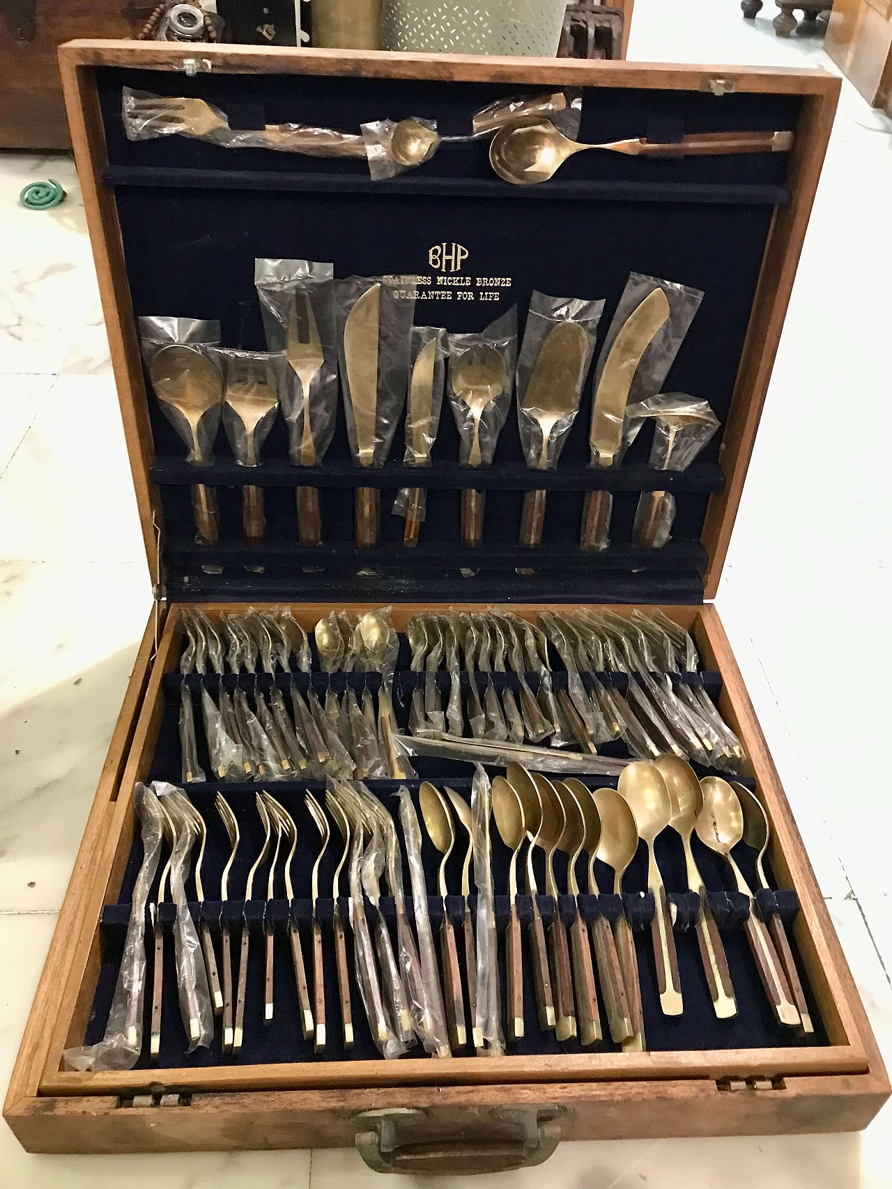 Brass-plated steel and teak cutlery set in wooden case, 1950s 1