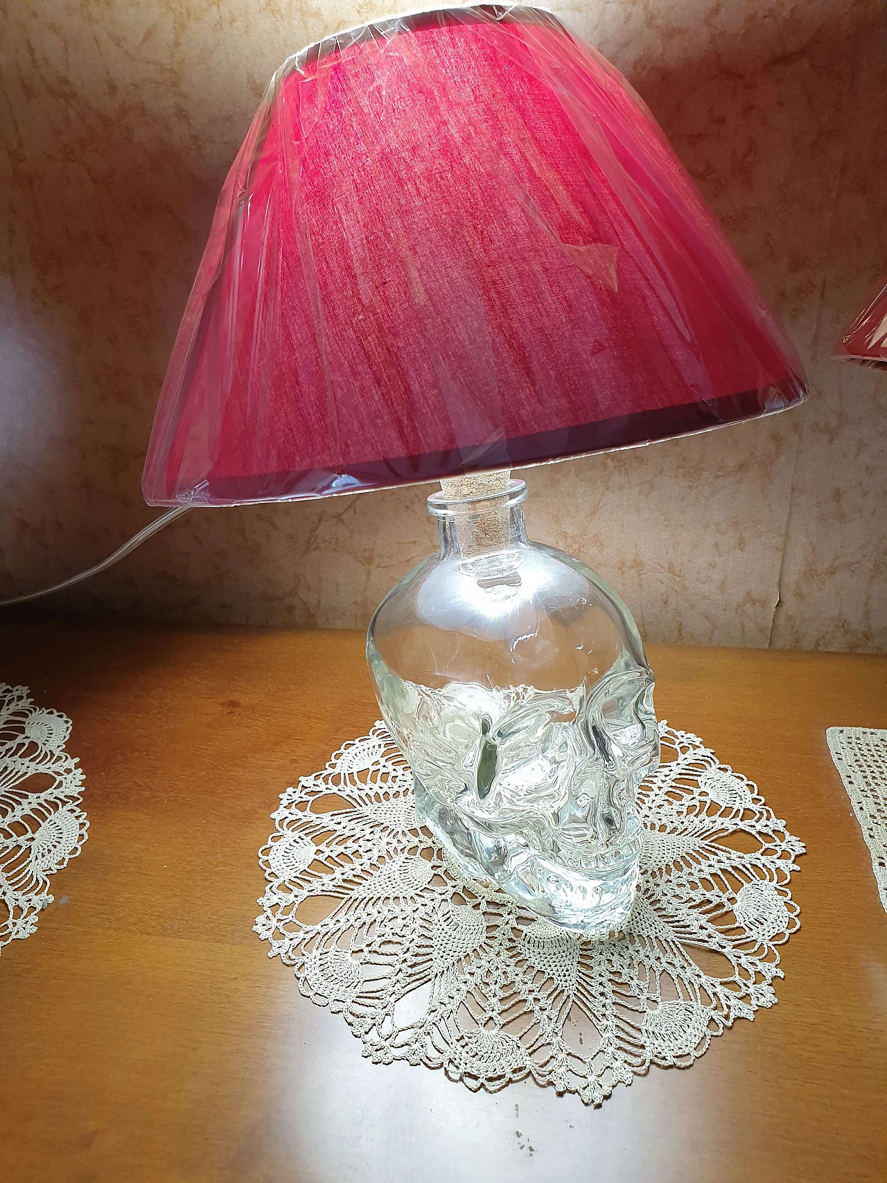 Pair of skull table lamps with Crystal Head Vodka bottle, 2000s 2