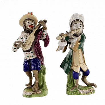 Pair of porcelain orchestral monkeys, late 19th century