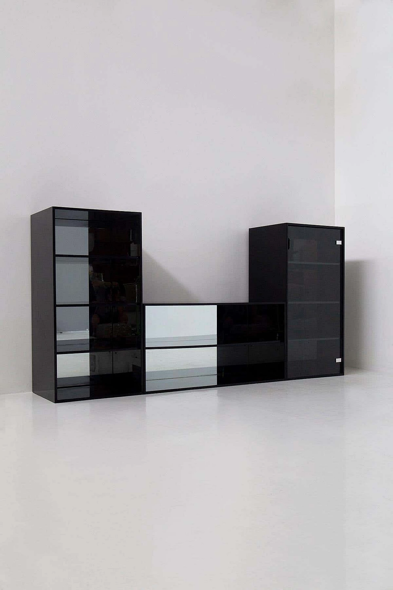 Pair of black lacquered wood bookcases and chest of drawers attributed to Acerbis, 1970s 1